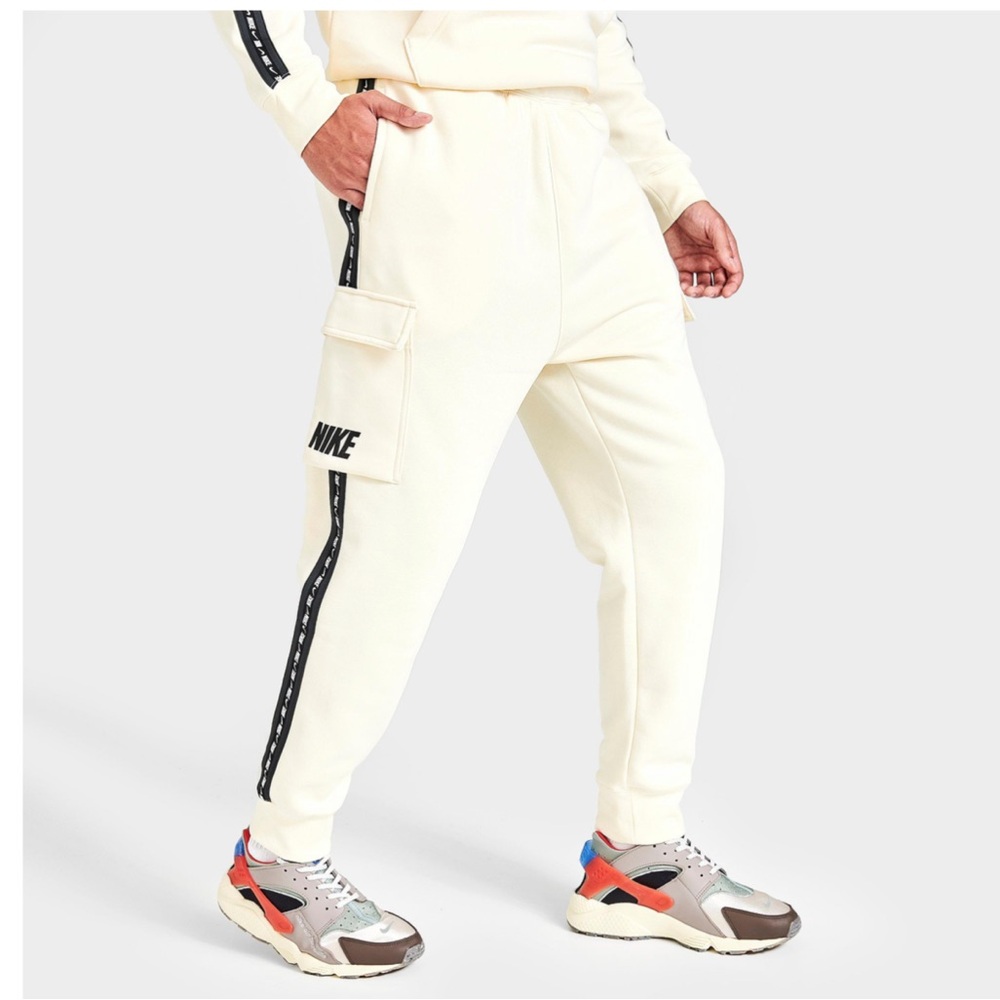 Nike Repeat Pack logo taped cargo joggers in off white